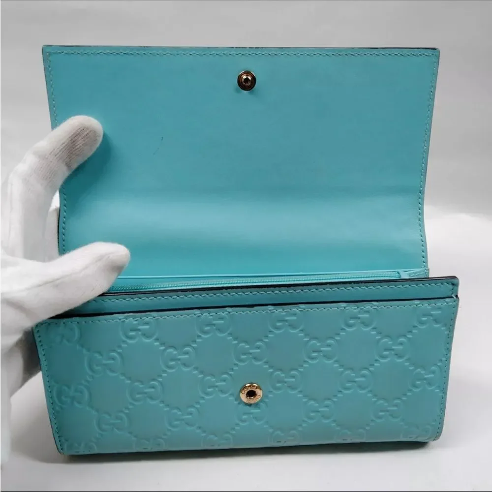 Auth Gucci Turquoise Blue GG Monogram MicroGuccisima Continental Wallet Bow